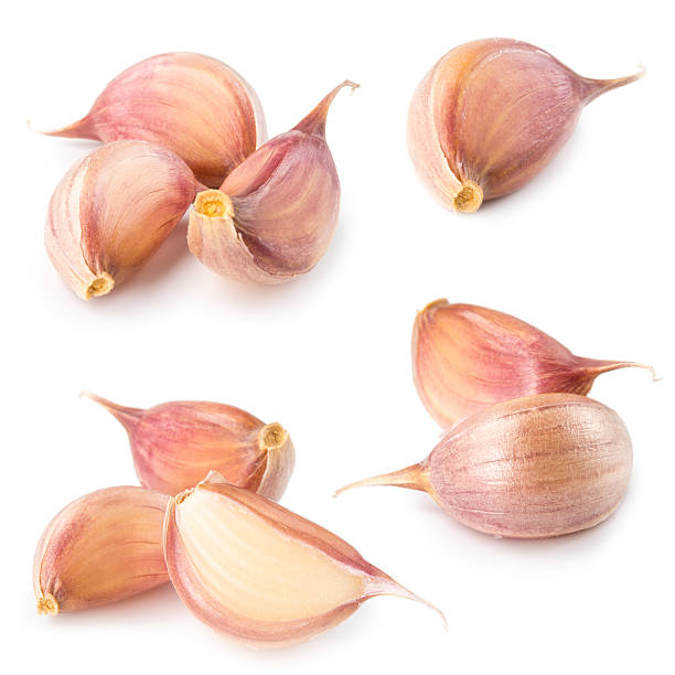 istock Garlic clove isolated on white. Collection 464456754