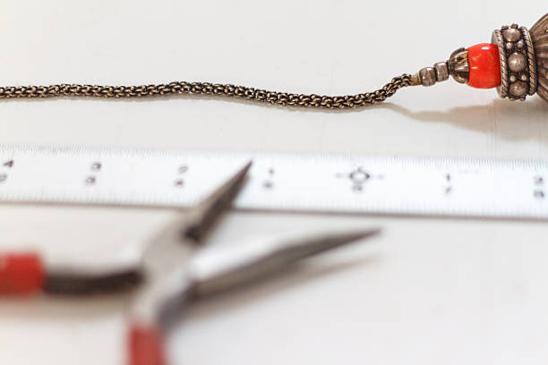istock Making/Repairing Jewelry with Needlenose Pliers 464457010