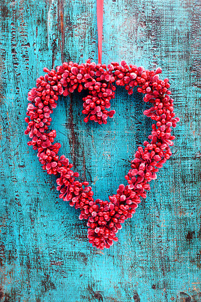 istock Heart decoration on blue wood 464460531