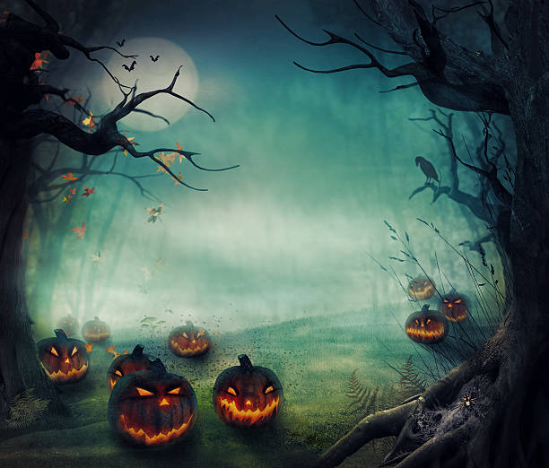 istock Menacing forest pumpkins, glowing on a foggy moonlit night 464460663