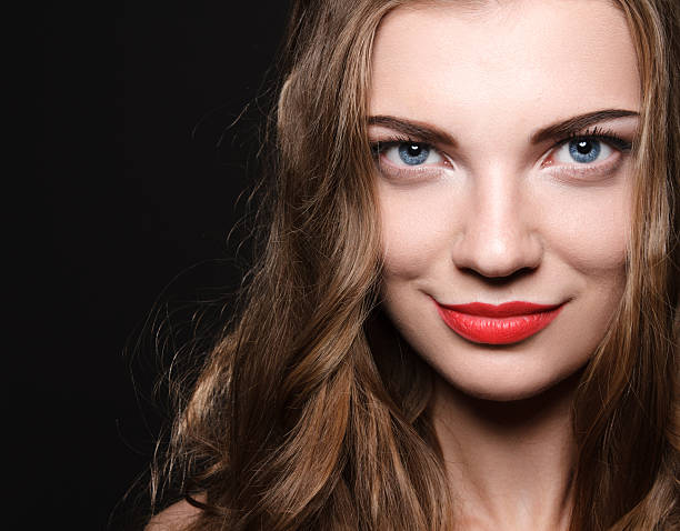 istock Beautiful caucasian young woman with red lips make up 464460870
