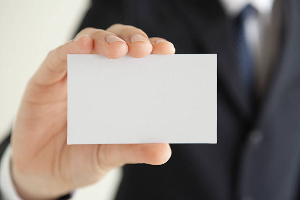 istock Hand of business man with a card 464466538