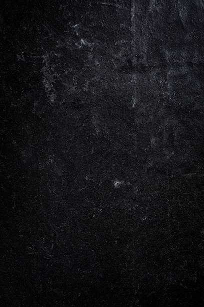 istock Overhead view of dark black coating material 464466680