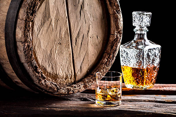 istock Glass of whiskey in the old cellar 464466838