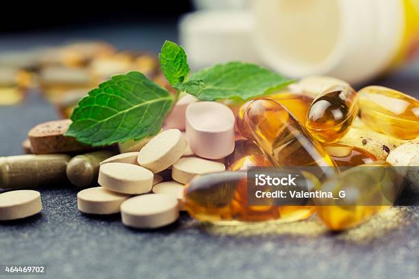 Pills And Multivitamins Stock Photo - Download Image Now - Nutritional Supplement, Vitamin, Food