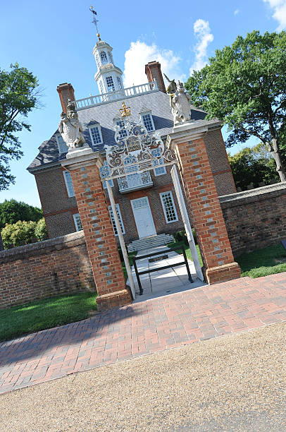 Governor's Palace in Williamsburg, Virginia Williamsburg,Virginia,USA - July 18, 2011 : A view of the entrance and the facade of the Governor's Palace governor's palace williamsburg stock pictures, royalty-free photos & images