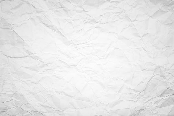 Crumpled white paper background stock photo