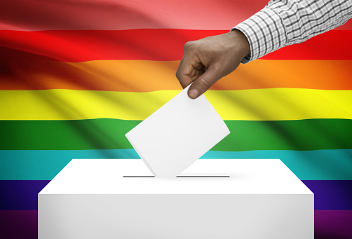 Ballot box with national flag on background - LGBT flag