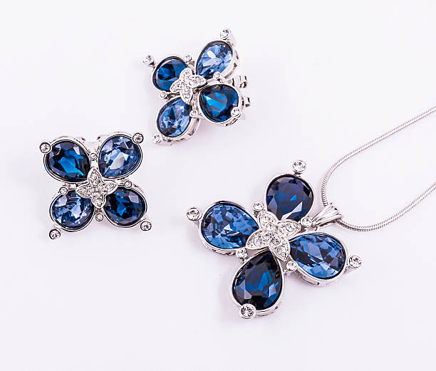 clover form sapphire jewelry set necklace and earrings stock photo