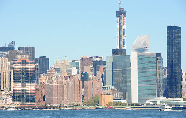 istock East River and Manhattan Skyline. Image taken from Brooklyn. 464476604
