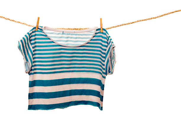 istock blue tshirt hanging on a rope clothesline 464479040
