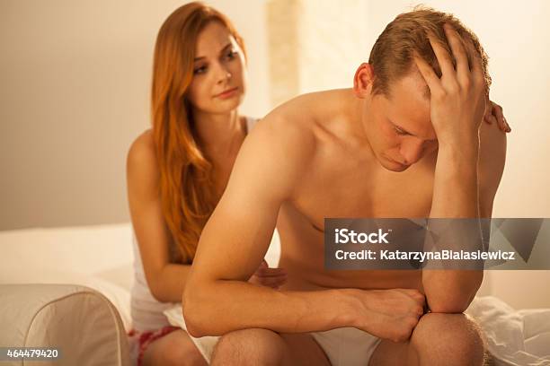 Cheering Up Woman Stock Photo - Download Image Now - Sexual Issues, Bed - Furniture, Men