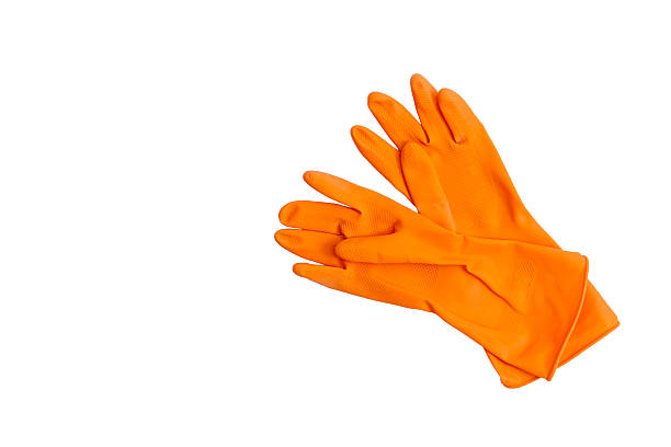 istock Orange cleaning rubber gloves. 464479594