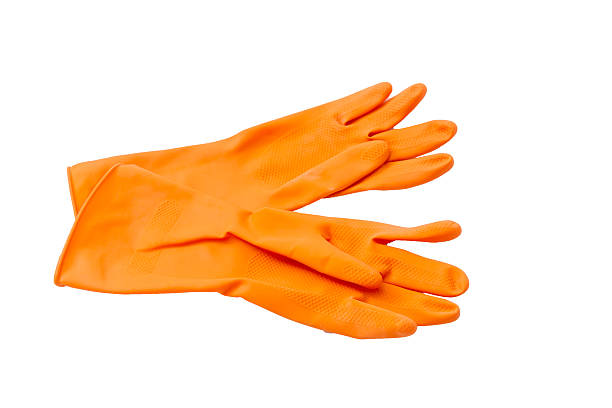 istock Orange cleaning rubber gloves. 464479760