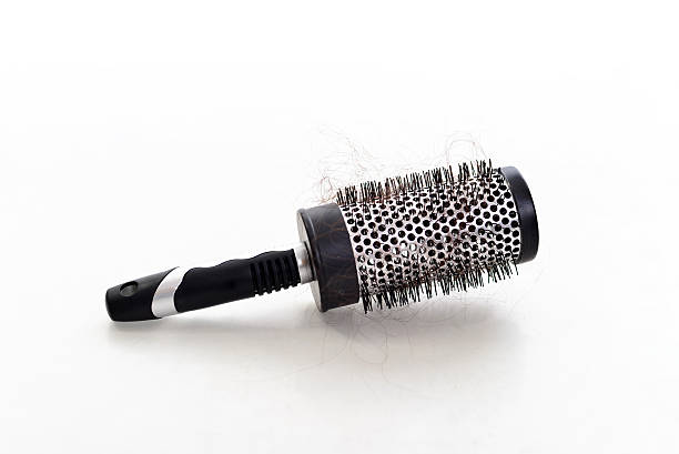 istock Hairbrush with hair 464479774