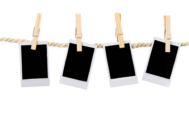 istock instant photographs hanging on a rope clothesline 464480476