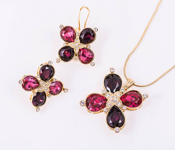 clover form ruby gems jewelry set necklace and earrings stock photo