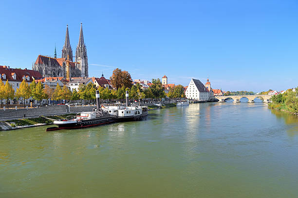 istock View on Danube river with Regensburg Cathedral, Germany 464486072