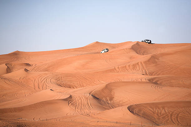 istock Desert dunes, an off-road vehicle 464487068