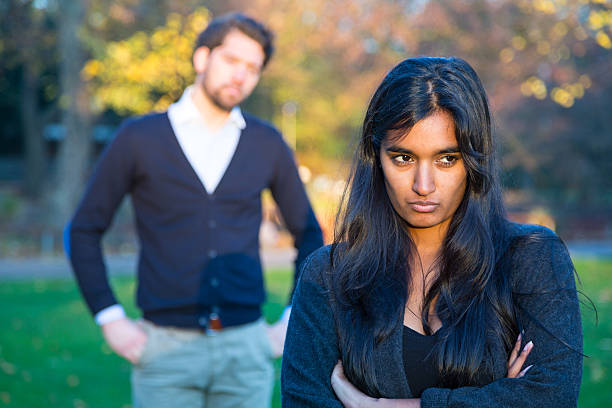 istock Couple after a fight outside in park 464487594