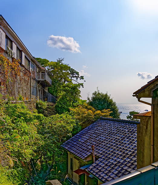 istock Old houses on the shore 464487648