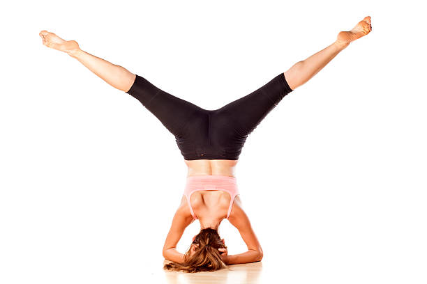 istock Young attractive girl doing yoga exercises 464490750