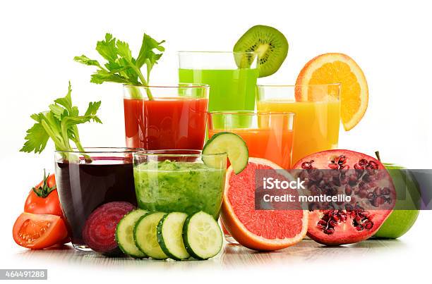 Glasses With Fresh Organic Vegetable And Fruit Juices On White Stock Photo - Download Image Now