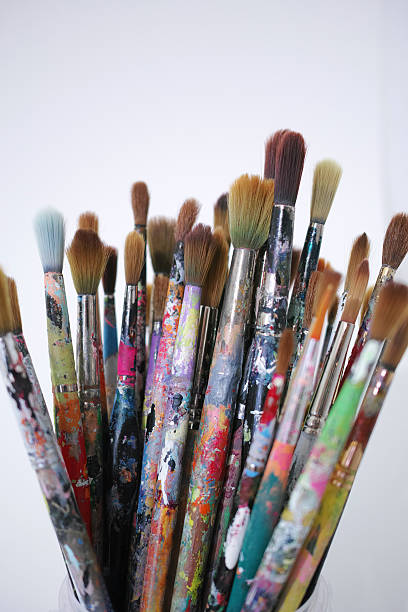 istock Bunch Of Colourful Paint Brushes 464492104