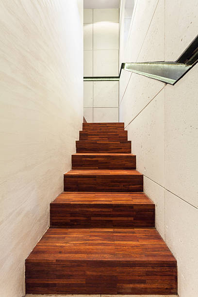 istock Wooden staircase in modern house 464492410