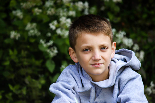 istock Young Boy With Serious Look 464504188