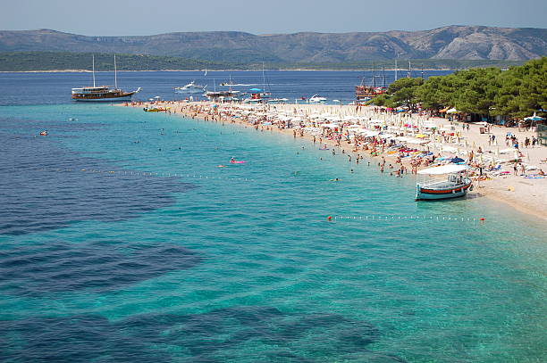 絵のように美しい風景にゴールドのケープにブラチ島、クロアチア - kiteboarding sunlight croatia dalmatia ストックフォトと画像