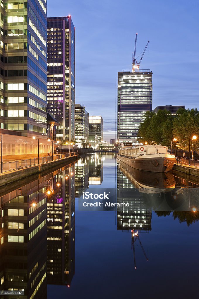 Modern apartments in Canary Wharf Modern apartments and new building under construction in a financial district of London, Canary Wharf Apartment Stock Photo