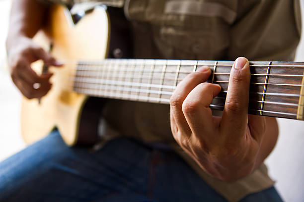 istock Playing guitar F# chord 464505945