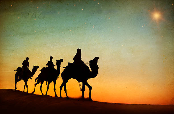 istock Group of People Riding Camel Isolated on Background 464508414