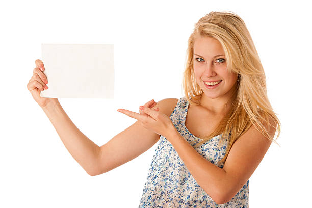 istock woman holding a blank whiteboard 464509142