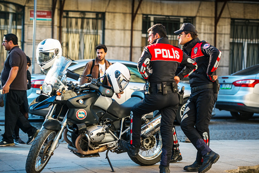 Istanbul, Turkey  - October 20, 2014: Turkish Policemen on motorcycles standing on Istanbul street