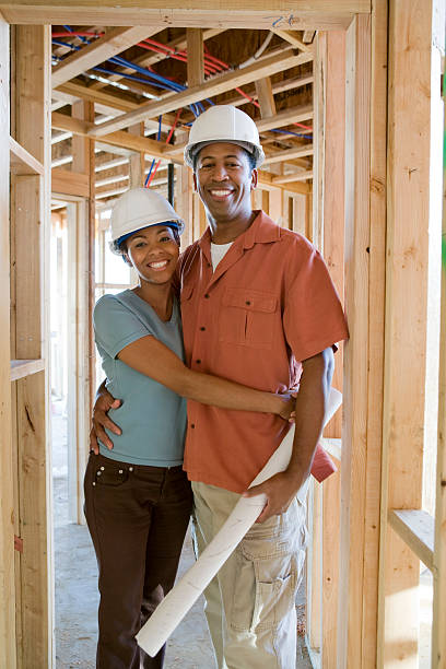 istock Young couple on building site 464509436