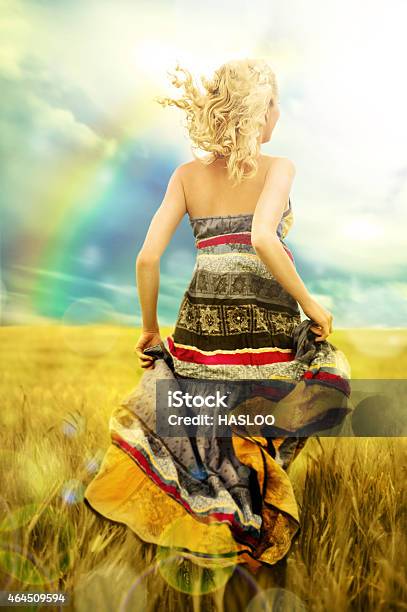 Portrait Of Romantic Woman Running Across Field Stock Photo - Download Image Now - Accessibility, Active Lifestyle, Activity