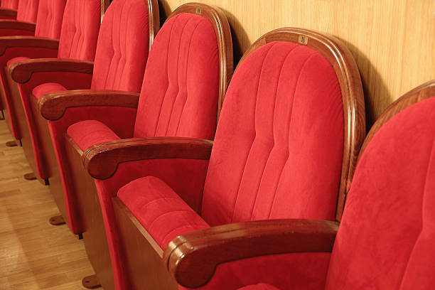 istock Background of red theatrical chairs 464509797