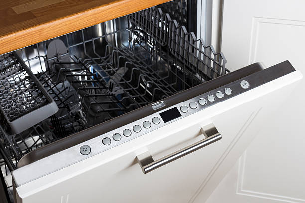 Dishwasher modern Half open empty dishwasher in a modern kitchen dishwasher stock pictures, royalty-free photos & images