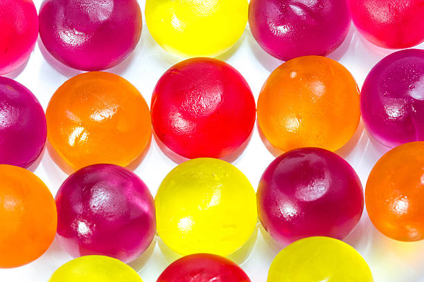 istock Close-up of colorful candy on white background. 464512972