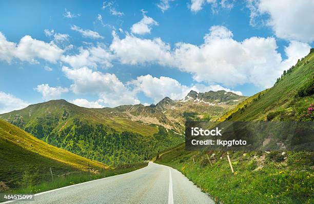 Mountain Road In The Alps Stock Photo - Download Image Now - Blue, Cloud - Sky, Europe