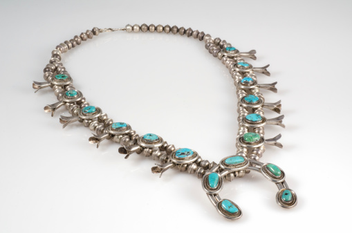 Sterling Silver and Turquoise Squash Blossom Necklace.