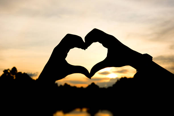 istock Hands and fingers in heart shape 464516224