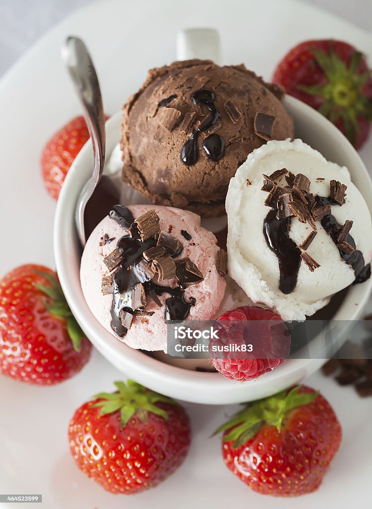 bowl of ice-cream bowl of ice-cream with strawberries Backgrounds Stock Photo