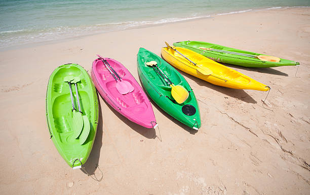 istock Colorful kayaks on the tropical beach 464524461