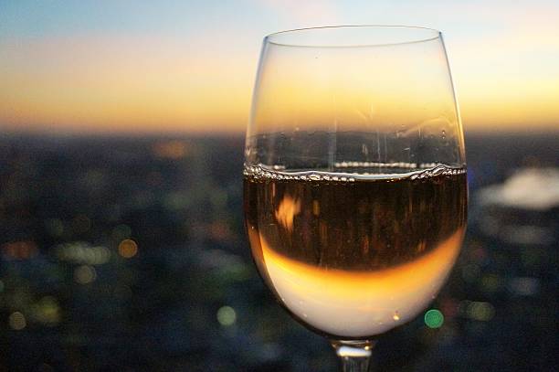 istock High rise glass of wine 464528786