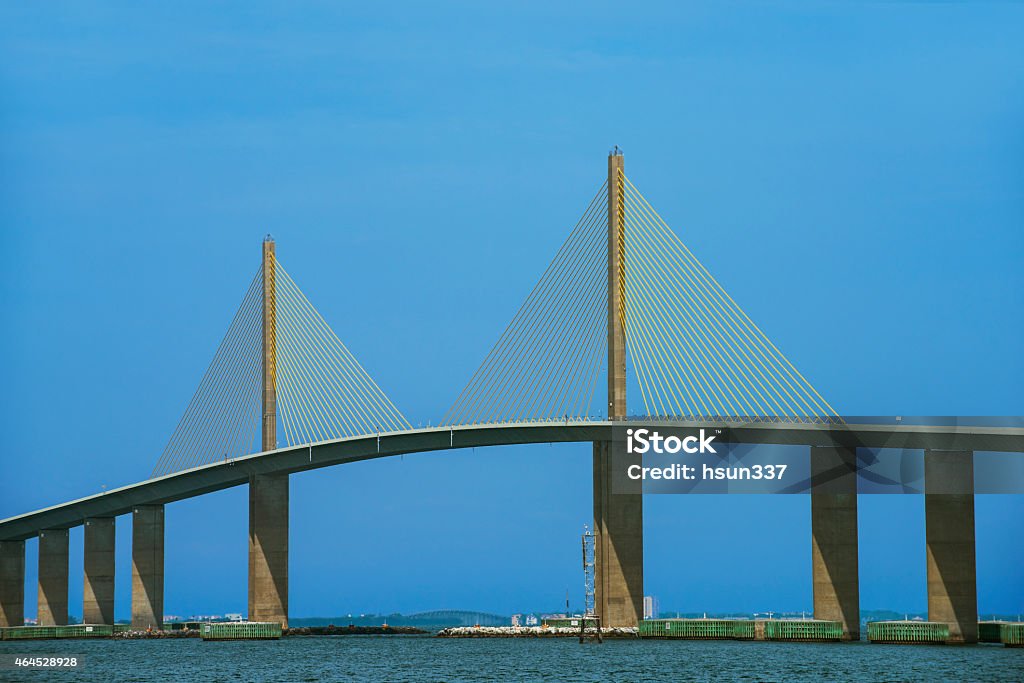 The Sunshine Skyway Bridge The Sunshine Skyway Bridge over Tampa Bay, Florida was opened to traffic on April 20, 1987. In 2005, the current bridge named after the Governor of Florida and then U.S. Senator who presided over its design and most of its construction. Elevated Walkway Stock Photo