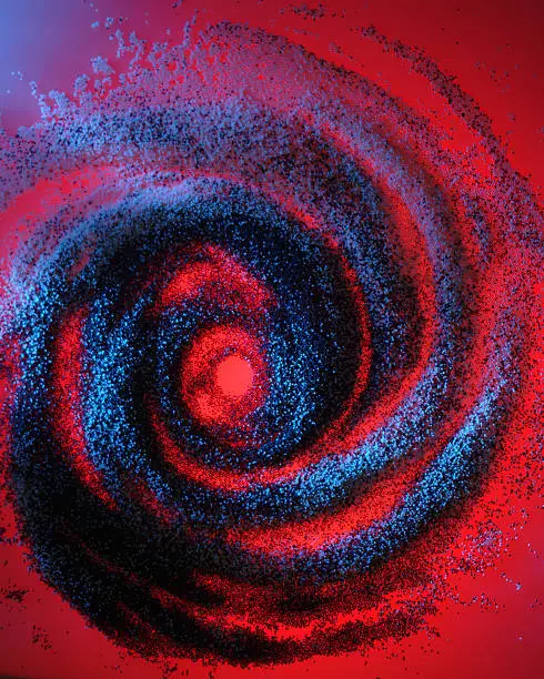Red background with pellets arranged in a swirl Pattern