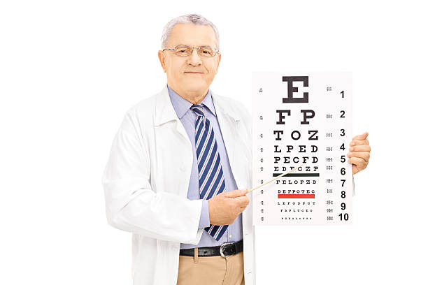 istock Middle aged male optician holding eyesight test 464540431